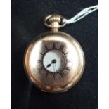 A GENTLEMAN'S YELLOW METAL HALF HUNTING CASE POCKET WATCH