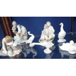 A COLLECTION OF LLADRO AND NAO FIGURINES