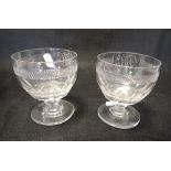 A PAIR OF CUT GLASS WINE GOBLETS