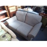 A TWO SEATER SOFA