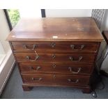 A GEORGE III MAHOGANY AND SYCAMORE STRUNG CHEST OF DRAWERS