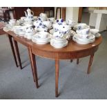 A MAHOGANY AND SATINWOOD BANDED EXTENDING DINING TABLE IN GEORGE III STYLE