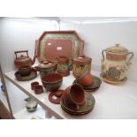 A TERRACOTTA PART TEA SERVICE IN EGYPTIAN TASTE