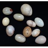 A COLLECTION OF MARBLE EGGS