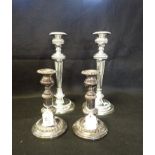 TWO PAIRS OF GEORGIAN STYLE SILVER PLATED CANDLESTICKS