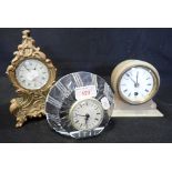 A GILT BAROQUE STYLE TABLE CLOCK