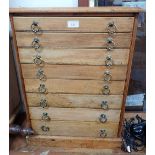 A STRIPPED PINE EIGHT DRAWER COLLECTORS CHEST