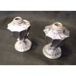 A PAIR OF SILVER PLATED LAMP BASES IN THE FORM OF URNS