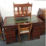 A STAINED WOOD PEDESTAL DESK IN GEORGE III STYLE