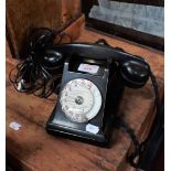 A VINTAGE BLACK BAKELITE TELEPHONE