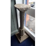 A RE-CONSTITUTED STONE GARDEN PILLAR