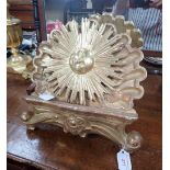 A FLORENTINE GILTWOOD BOOKSTAND