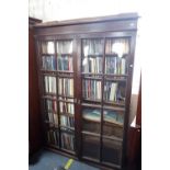 A 19TH CENTURY MAHOGANY BOOKCASE WITH GLAZED DOORS