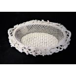 A LATTICE GLASS BOWL by Belleek of Ireland