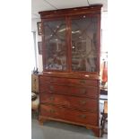 A LATE GEORGE III OR REGENCY GLAZED AND MAHOGANY SECRETAIRE BOOKCASE