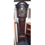 A 1930S OAK CASED GRANDMOTHER CLOCK WITH BRASS DIAL