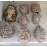 A COLLECTION OF POTTERY HEADS