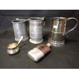 A LARGE SILVER PLATED TANKARD