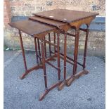 A NEST OF THREE MAHOGANY TABLES