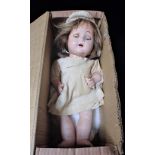 A VINTAGE COMPOSITE DOLL