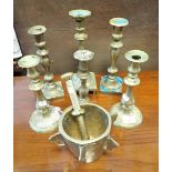 A COLLECTION OF ASSOCIATED BRASS CANDLESTICKS