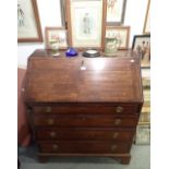 A GEORGE III OAK BUREAU