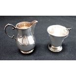 A SILVER CREAM JUG