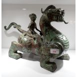 AN ARCHAIC BRONZE MYTHICAL BEAST AND RIDER
