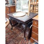 A CHIPPENDALE STYLE WRITING TABLE