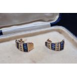 A PAIR OF DIAMOND AND SAPPHIRE EARRINGS