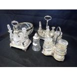 A VICTORIAN SILVER PLATED PART CRUET SET