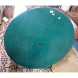 A GREEN PAINTED FOLDING METAL GARDEN TABLE with central hole for parasol, 97cms dia.