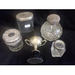 A COLLECTION OF CUT GLASS JARS WITH SILVER LIDS, together with a small presentation case