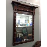 A 19TH CENTURY MAHOGANY FRAMED WALL MIRROR, 78cm high