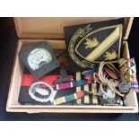 A COLLECTION OF MILITARIA, to include a miniature set of medals, badges and sundries