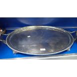 A LARGE SILVER PLATED OVAL TRAY, 73cm long