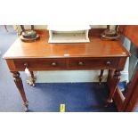 A 19TH CENTURY MAHOGANY WRITING TABLE on reeded legs, 106cm wide