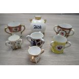 A ROYAL WORCESTER VASE and a collection of miniature tygs