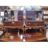 A PAIR OF MAHOGANY BEDSIDE TABLES