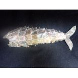 A MOTHER OF PEARL ARTICULATED FISH