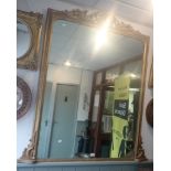 A VICTORIAN GILT FRAMED OVERMANTLE MIRROR, 133cm high x 121cm wide