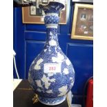 A CHINESE BOTTLE VASE, 24cm high (examine)