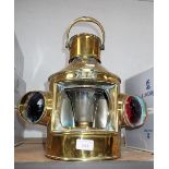 A 19TH CENTURY BRASS CASED SHIP'S LAMP, 36cm high