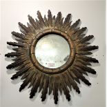 AN ITALIAN GILTWOOD SUNBURST WALL MIRROR, 56cm dia