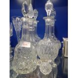 A COLLECTION OF CUT GLASS DECANTERS (5)