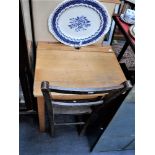 A CHILD'D BEECH SCHOOL DESK and a similar chair