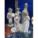 THREE LLADRO FIGURES and two Nao figures (5)