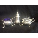 A SILVER CRUET SET WITH BLUE GLASS LINERS, in a fitted presentation case