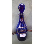 A 19TH CENTURY BRISTOL BLUE DECANTER, 'RUM' and a similar jug (2)