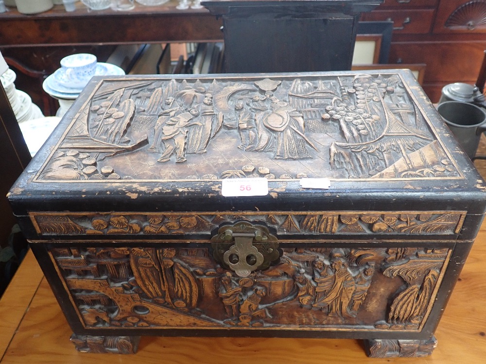 A CARVED CAMPHOR WOOD CHEST